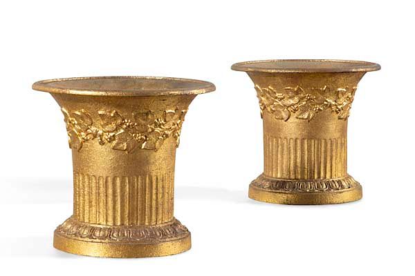 Appraisal: A pair of Neoclassical style gilt iron cache pots A