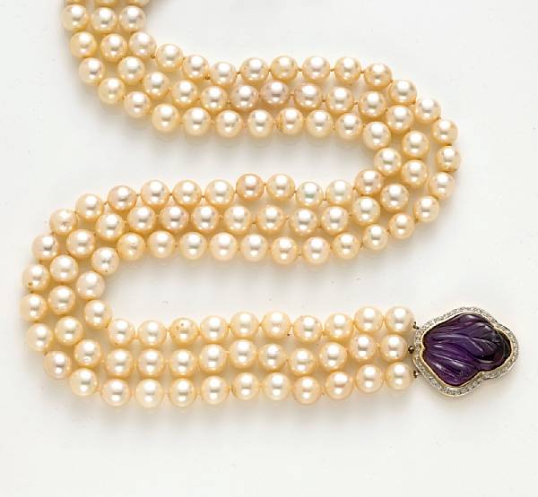 Appraisal: A cultured pearl carved amethyst and diamond triple strand necklace