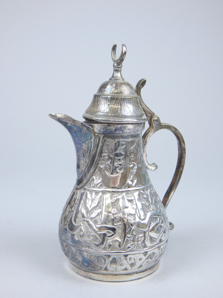 Appraisal: An Eastern white metal small coffee pot the lid with