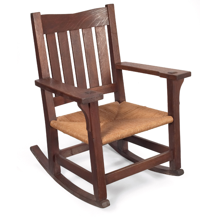 Appraisal: Gustav Stickley rocker ''V''back form with five vertical slats over