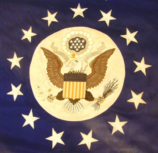 Appraisal: Silk with embroidered State Department Seal surrounded by stars in