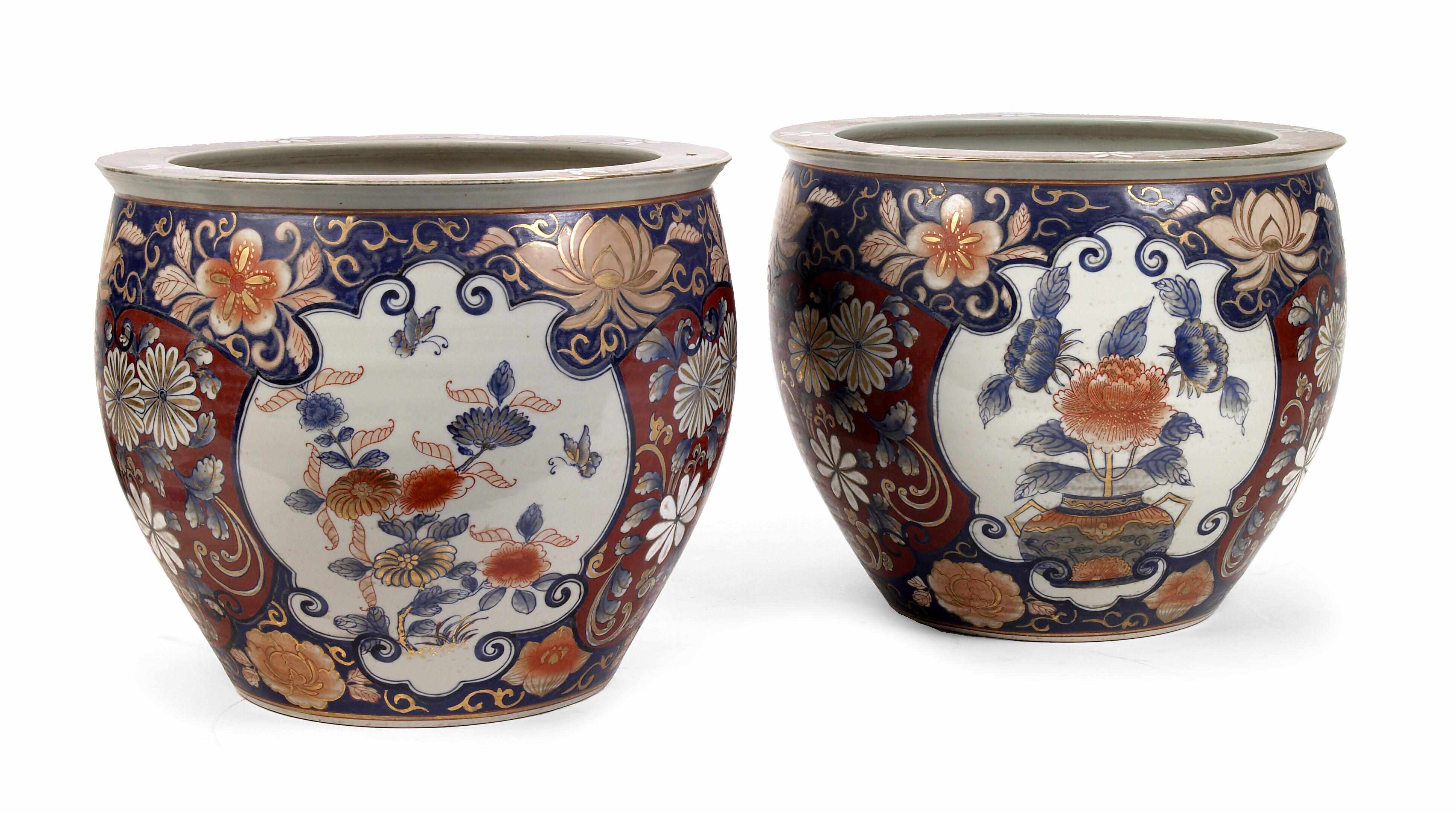 Appraisal: A pair of mid-size Japanese Imari porcelain jardinieres with floral