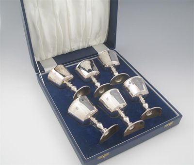 Appraisal: A modern cased set of six wine goblets with baluster