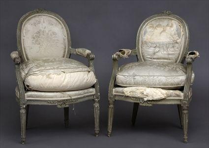 Appraisal: PAIR OF LOUIS XVI CARVED AND GREY PAINTED FAUTEUILS Each