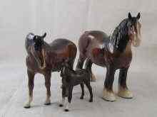 Appraisal: Beswick horses A shire horse cm high a mare cm