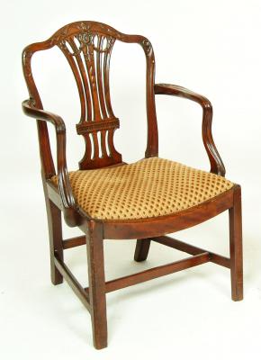 Appraisal: A GEORGE III MAHOGANY ELBOW CHAIR th century the arched