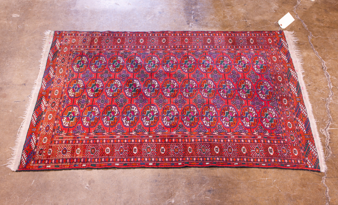 Appraisal: AN AFGHAN BOKHARA CARPET An Afghan Bokhara carpet ' x