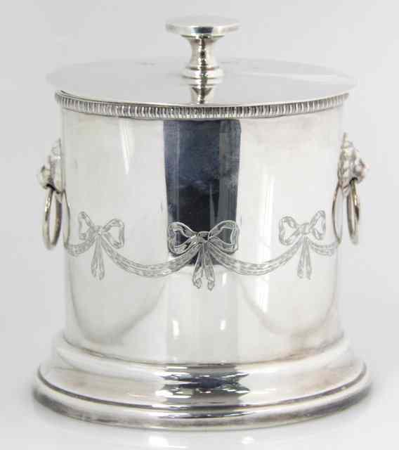 Appraisal: A silver biscuit barrel London engraved with ribbon tied swags