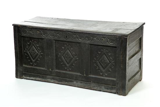 Appraisal: CARVED COFFER England th century oak Carved panels and carved