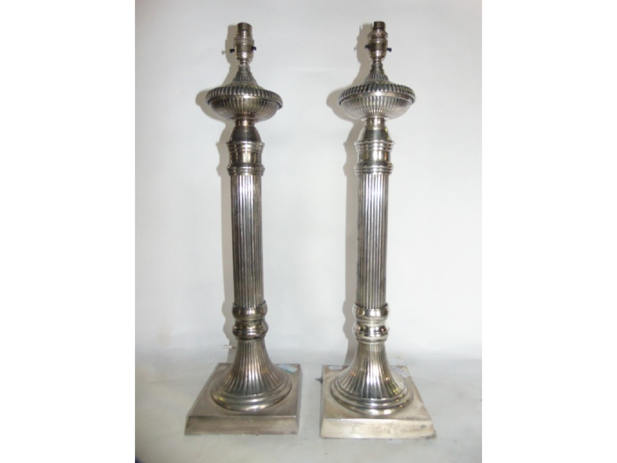 Appraisal: A large pair of contemporary electroplated desk lamps in the