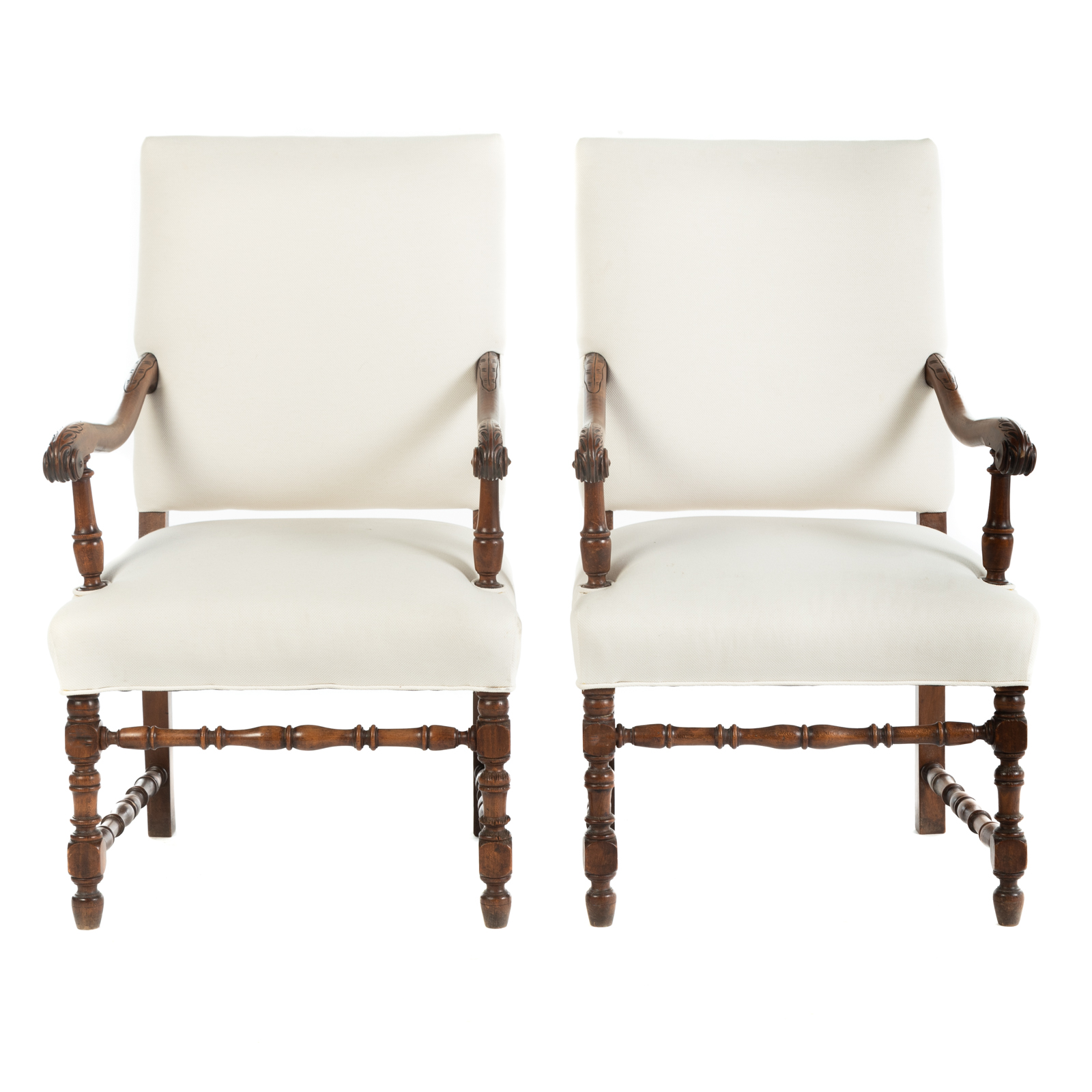 Appraisal: A PAIR OF JACOBEAN UPHOLSTERED ARMCHAIRS Late th century walnut