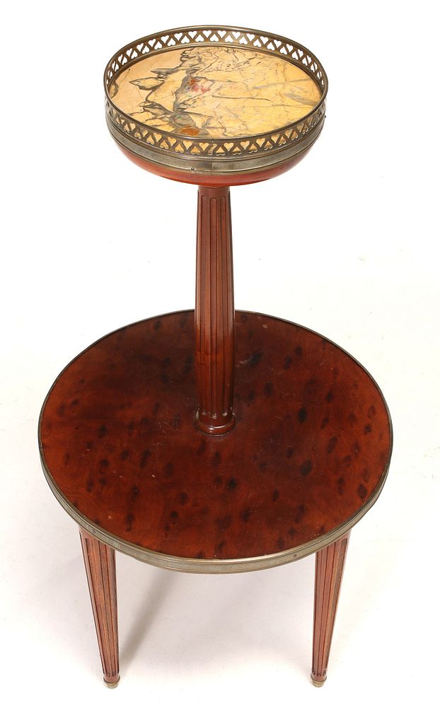 Appraisal: AN UNUSUAL AND HIGHLY FIGURED FRENCH TWO-TIER STAND The circular