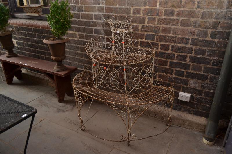 Appraisal: A VICTORIAN THREE TIER PLANT STAND A VICTORIAN THREE TIER