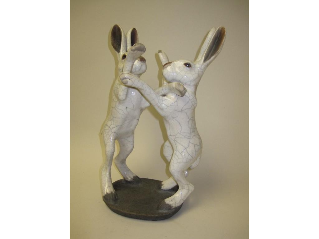 Appraisal: Pair of John Hine raku pottery Boxing Hares in