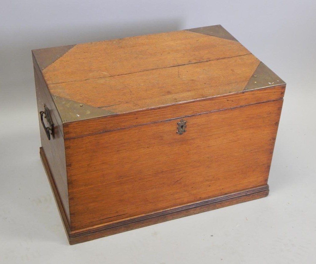 Appraisal: A late th-early thC oak and brass band plate chest