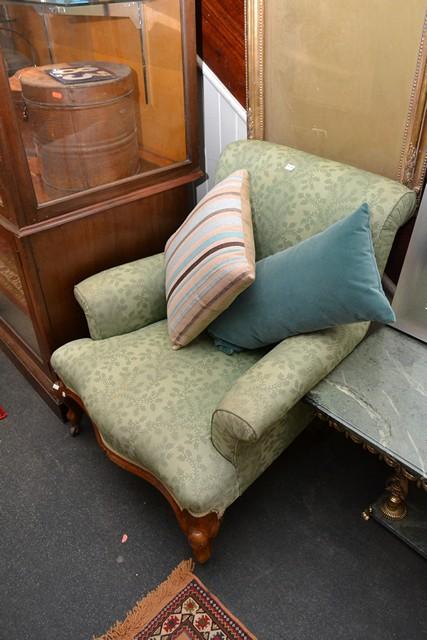 Appraisal: A VICTORIAN WALNUT ARMCHAIR IN GREEN UPHOLSTERY AND A RED