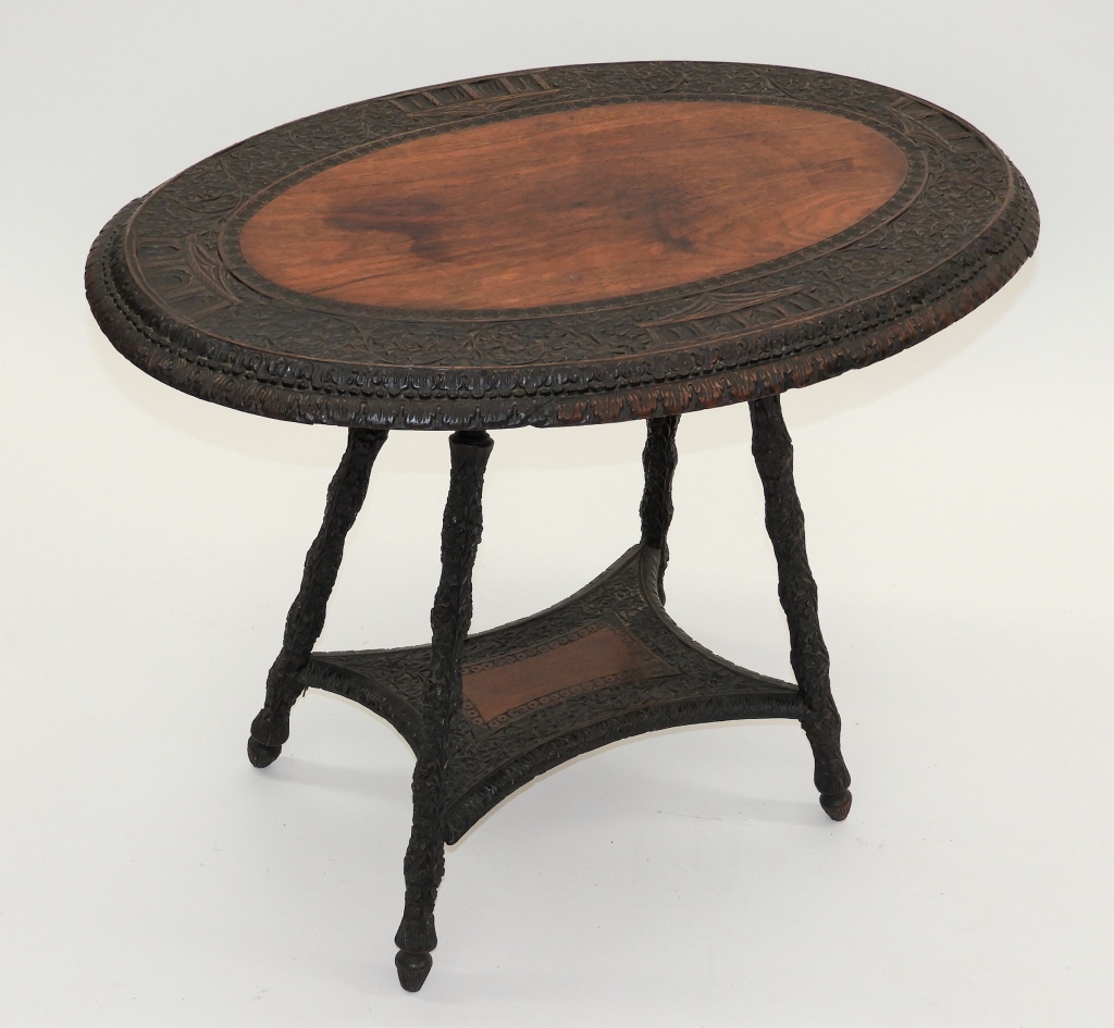 Appraisal: ANGLO-INDIAN CARVED HARDWOOD SIDE TABLE India Circa Oval top with