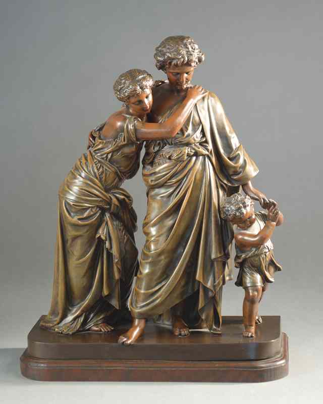 Appraisal: A BRONZED SPELTER PATINATED FIGURAL GROUP depicting a young Holy