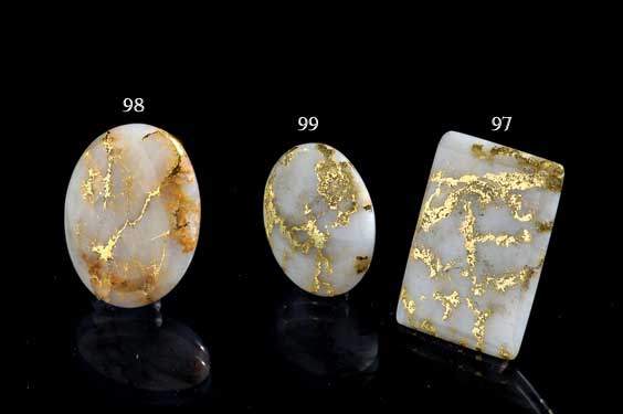 Appraisal: GOLD QUARTZ CABOCHON Australian High Carat Gold A rectangular cabochon