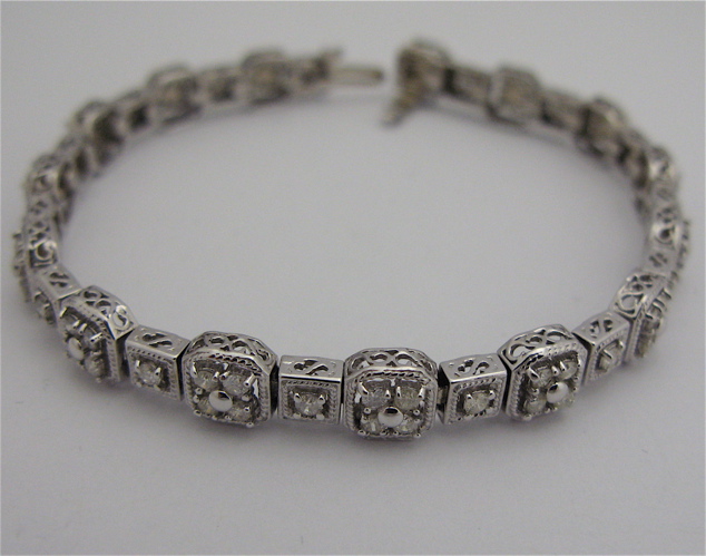 Appraisal: DIAMOND AND KARAT WHITE GOLD BRACELET inches in length and