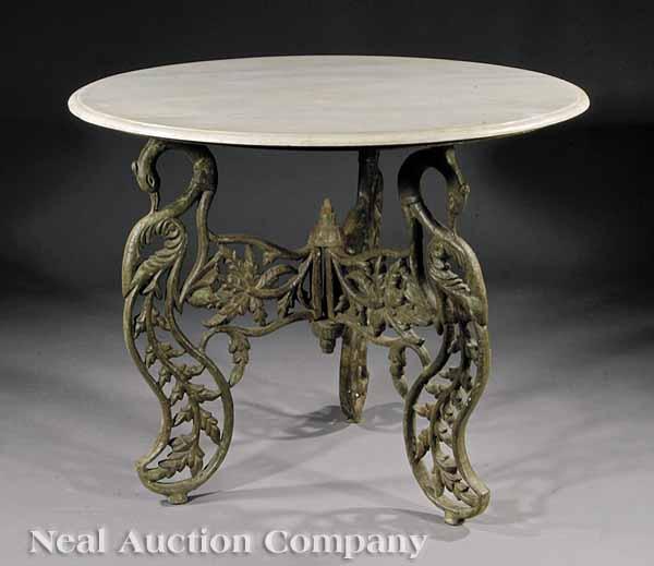 Appraisal: A Cast Iron Center Table circular marble top tripartite base