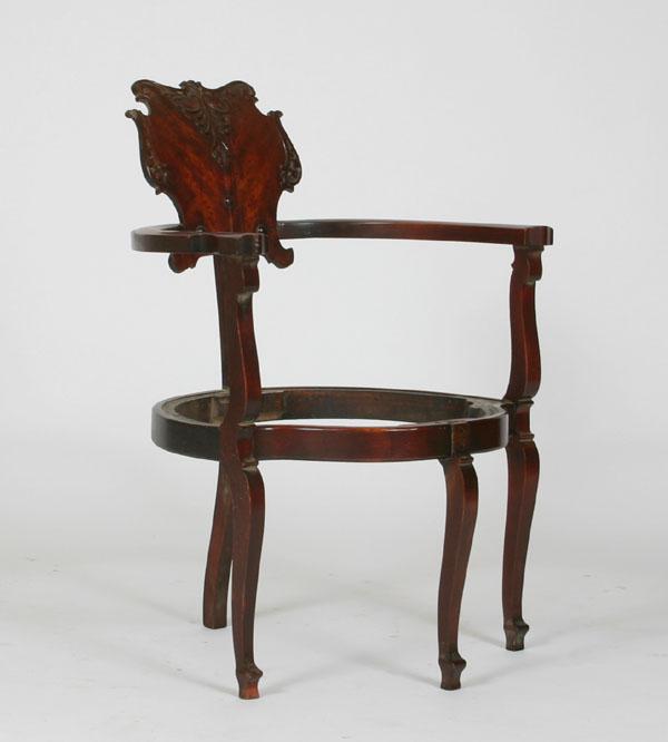 Appraisal: Victorian mahogany corner sword chair with arched shield back H