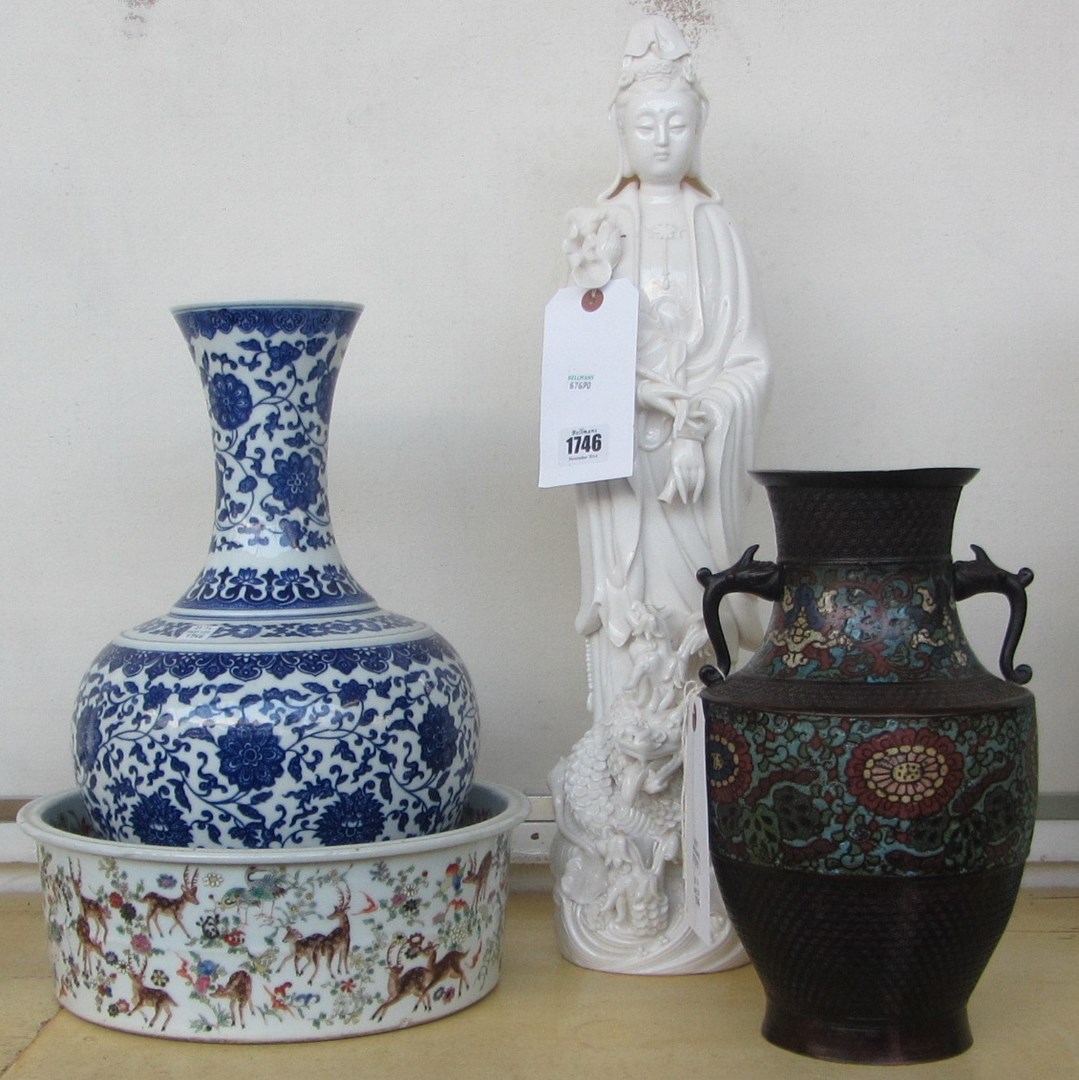 Appraisal: A quantity of Asian decorative pieces comprising a modern white