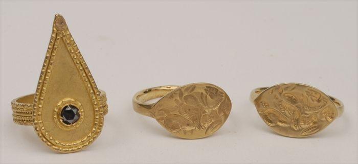 Appraisal: THREE GOLD RINGS Two with stamped design the rd set