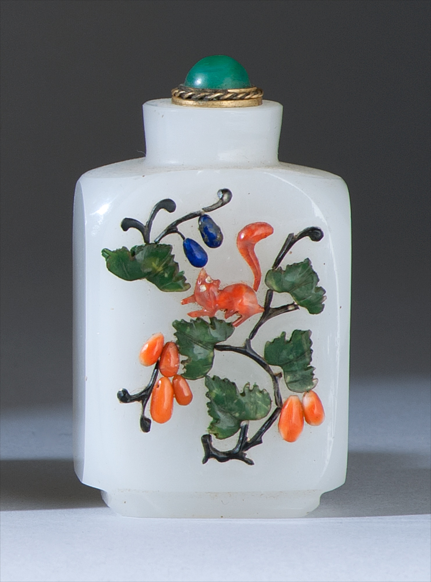 Appraisal: EMBELLISHED WHITE GLASS SNUFF BOTTLE Circa In rectangular form with