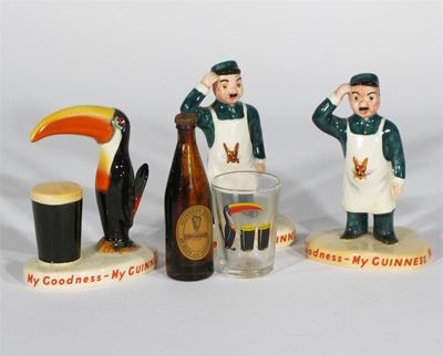 Appraisal: Two Carlton Ware Guinness Zoo Keeper bar figures after John