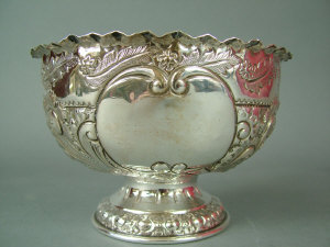 Appraisal: A silver pedestal rose bowl chased with leaves and scrolls