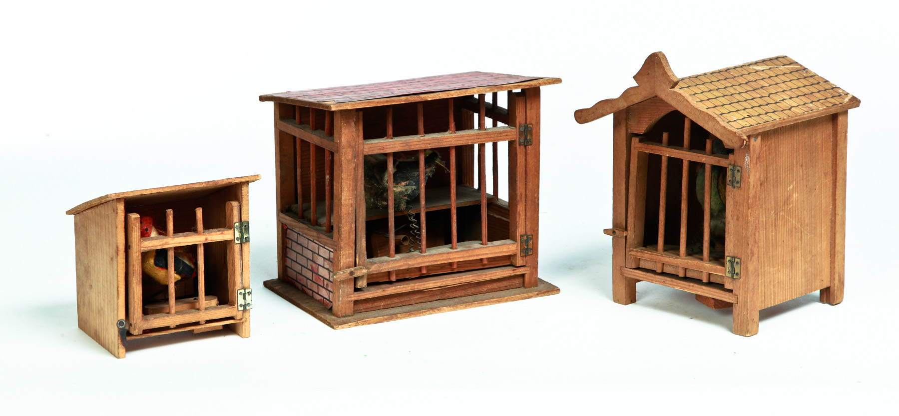 Appraisal: THREE GERMAN PIPSQUEAKS Late th-early th century Chicken coops with