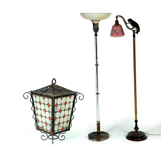 Appraisal: THREE LIGHTS American th century Two floor lamps Glass base