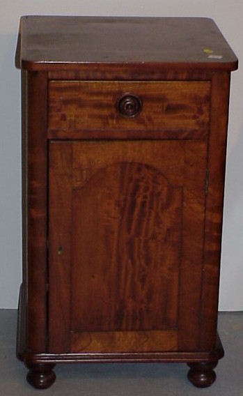 Appraisal: Victorian walnut bedside cabinet rectangular top with rounded corners over