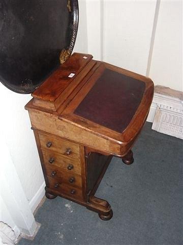 Appraisal: A TH CENTURY WALNUT DAVENPORT fitted four drawers to one