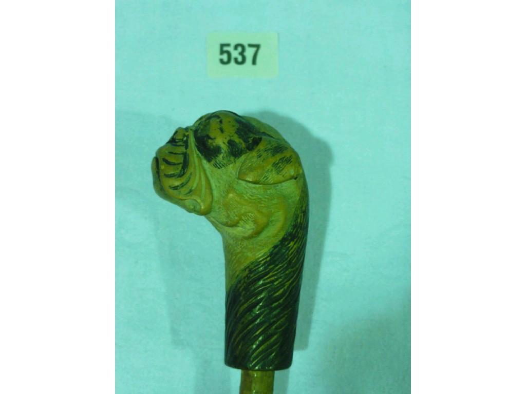 Appraisal: The handle of a parasol in the form of a