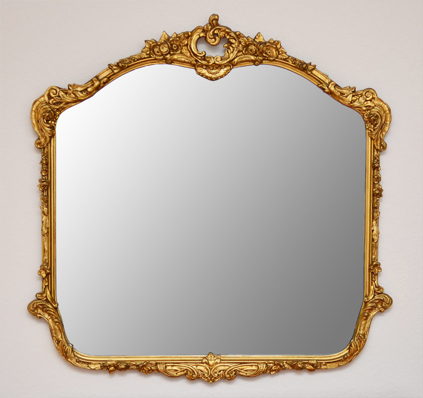 Appraisal: CARVED GILT WOOD WALL MIRROR Carved gilt wood frame with