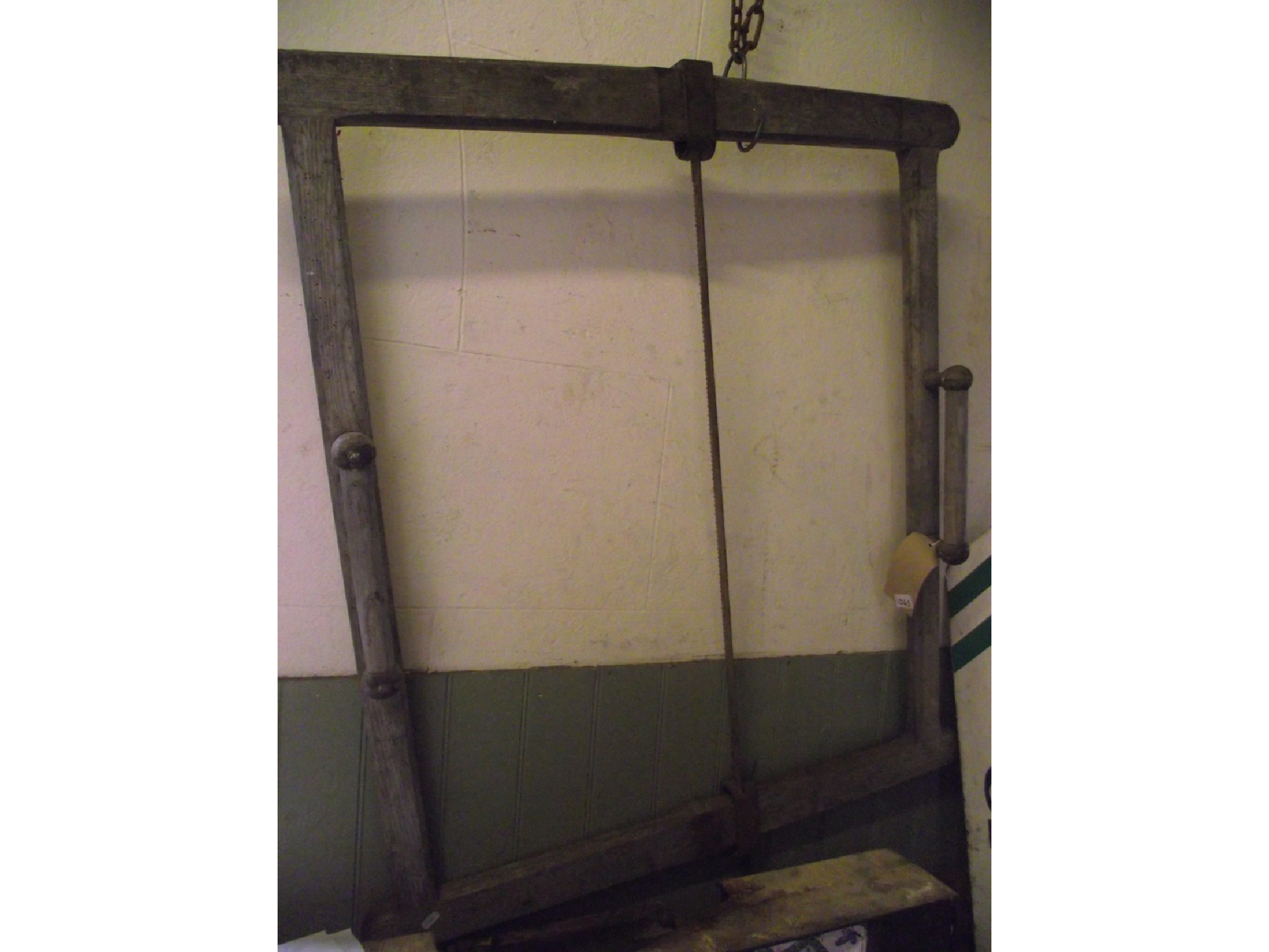 Appraisal: A vintage silvered oak or ash framed two man saw