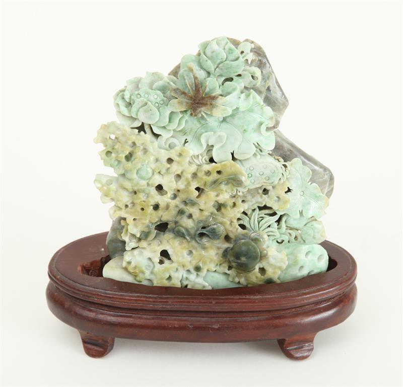 Appraisal: CHINESE CARVED MULTI-COLORED JADE MOUNTAIN The front pierced and carved