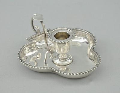 Appraisal: An English Sterling Silver Chamber Candlestick ca Plate in a