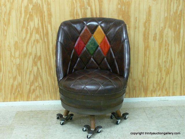 Appraisal: Whiskey Barrel Swivel Chair - Naugahyde - Matches the sofa