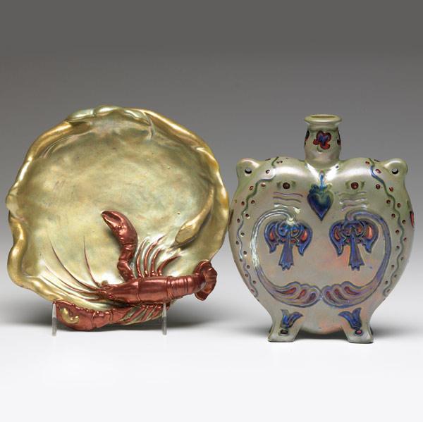 Appraisal: ZSOLNAY Two pieces a heart-shaped flask painted with purple blossoms