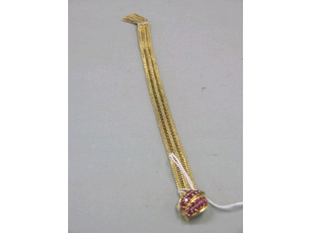 Appraisal: A Kutchinsky ct gold and ruby bracelet flexible mesh design