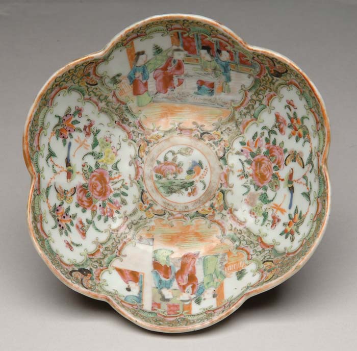 Appraisal: ROSE MEDALLION SHAPED BOWL Four panels having figures birds and