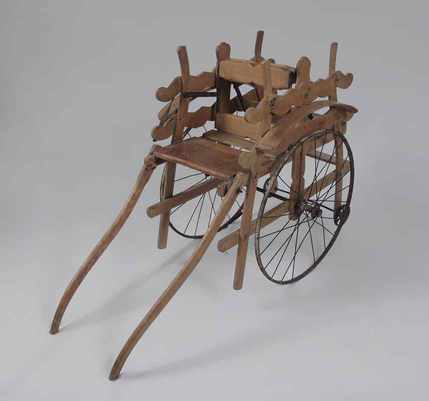 Appraisal: SCRUBBED PINE CHILD'S METAMORPHIC CART Transforms from two seat cart