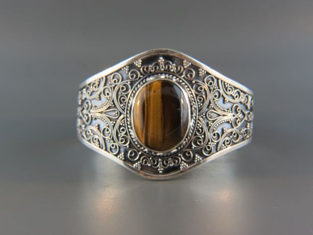 Appraisal: Tigerseye Bracelet rich oval gem in ornate sterling silver at