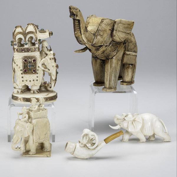 Appraisal: Five ivory elephants th C Jeweled Asian elephant with top