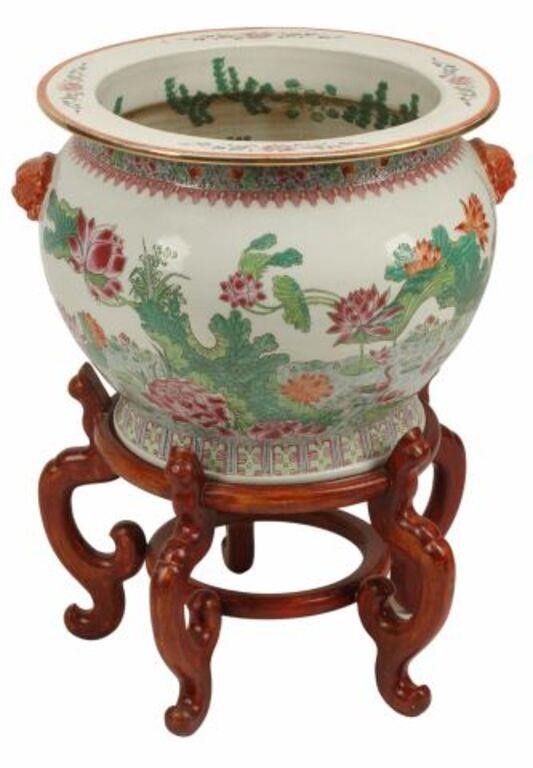 Appraisal: Chinese famille rose porcelain fishbowl on stand honorific Qianlong style