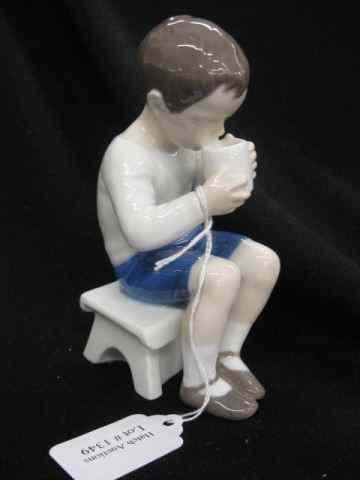 Appraisal: Bing Grondahl Porcelain Figurine of a SeatedBoy Drinking '' excellent