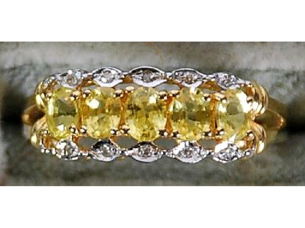 Appraisal: ct GOLD RING set with a row of five yellow